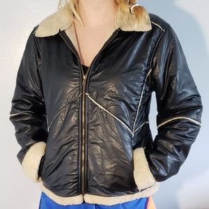 KC Collections a polyvinyl and acrylic jacket